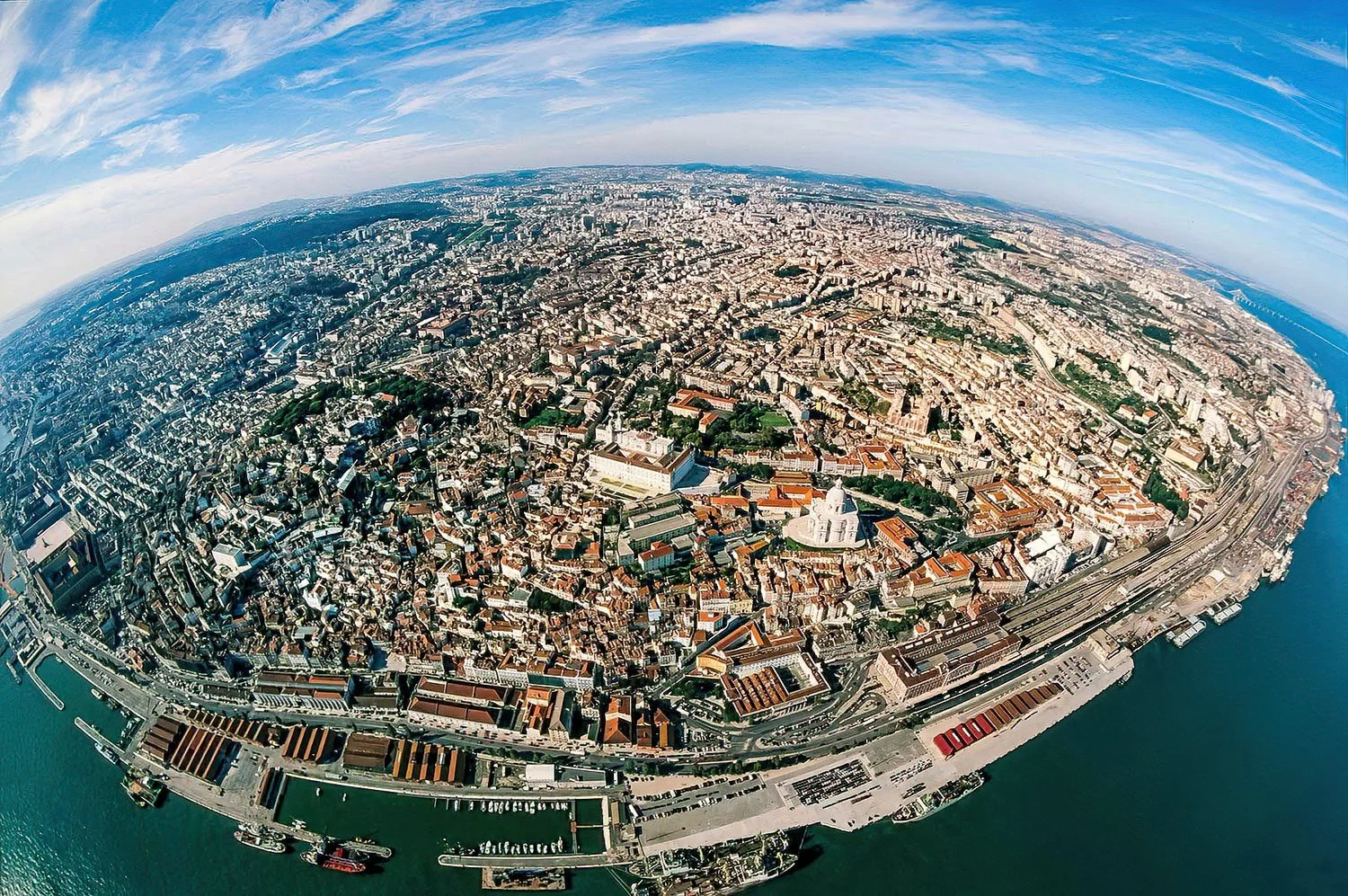 An aerial photo fisheye view of Lisbon, Portugal.  Lisbon is one of Europe’s oldest cities, with roots stretching back over 2,000 years.
