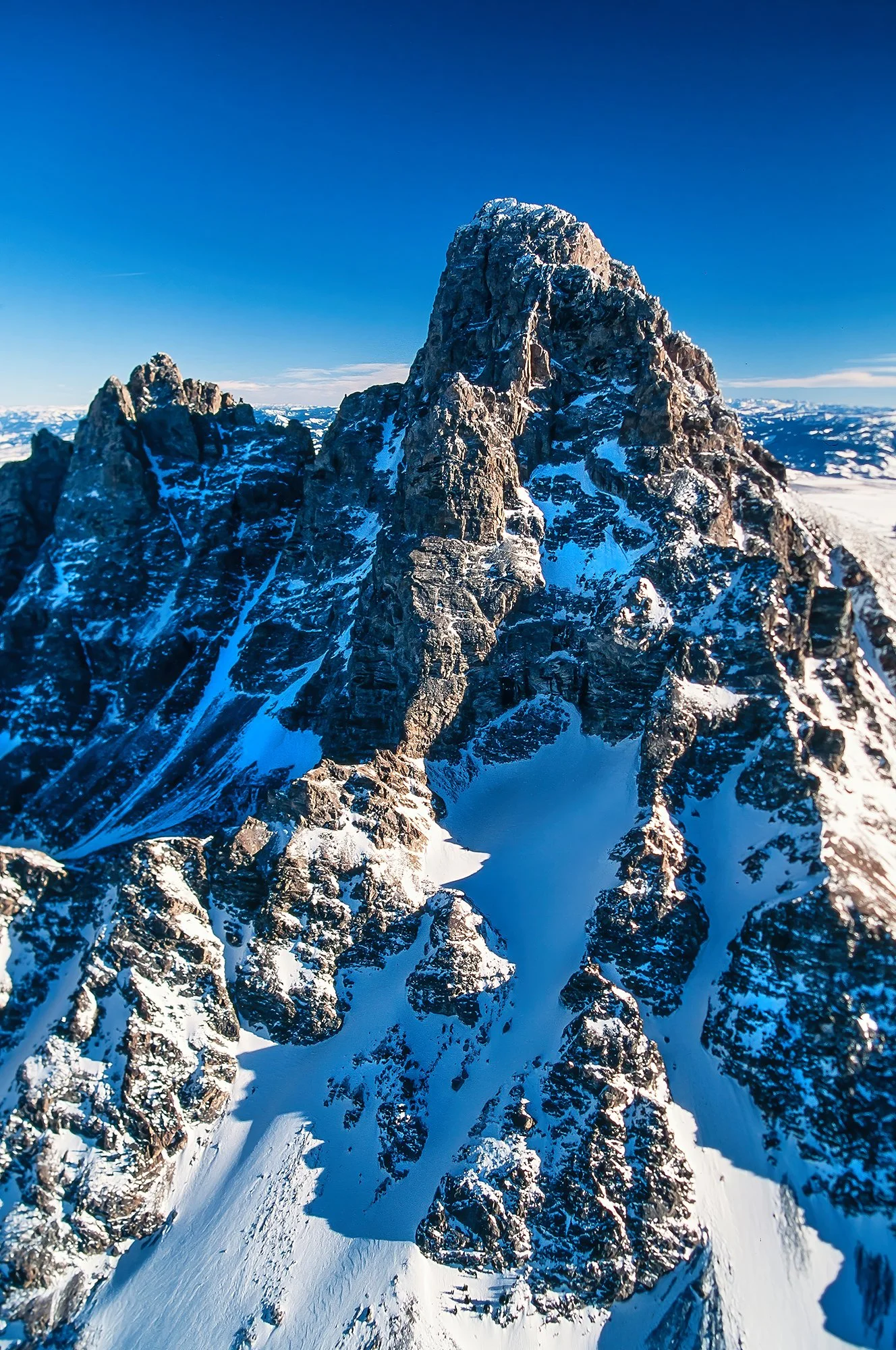 An aerial photo of the Grand Teton, Wyoming, USA at 13,775 feet (4,199 m) temperature -40°F or -40°C with wind chill.