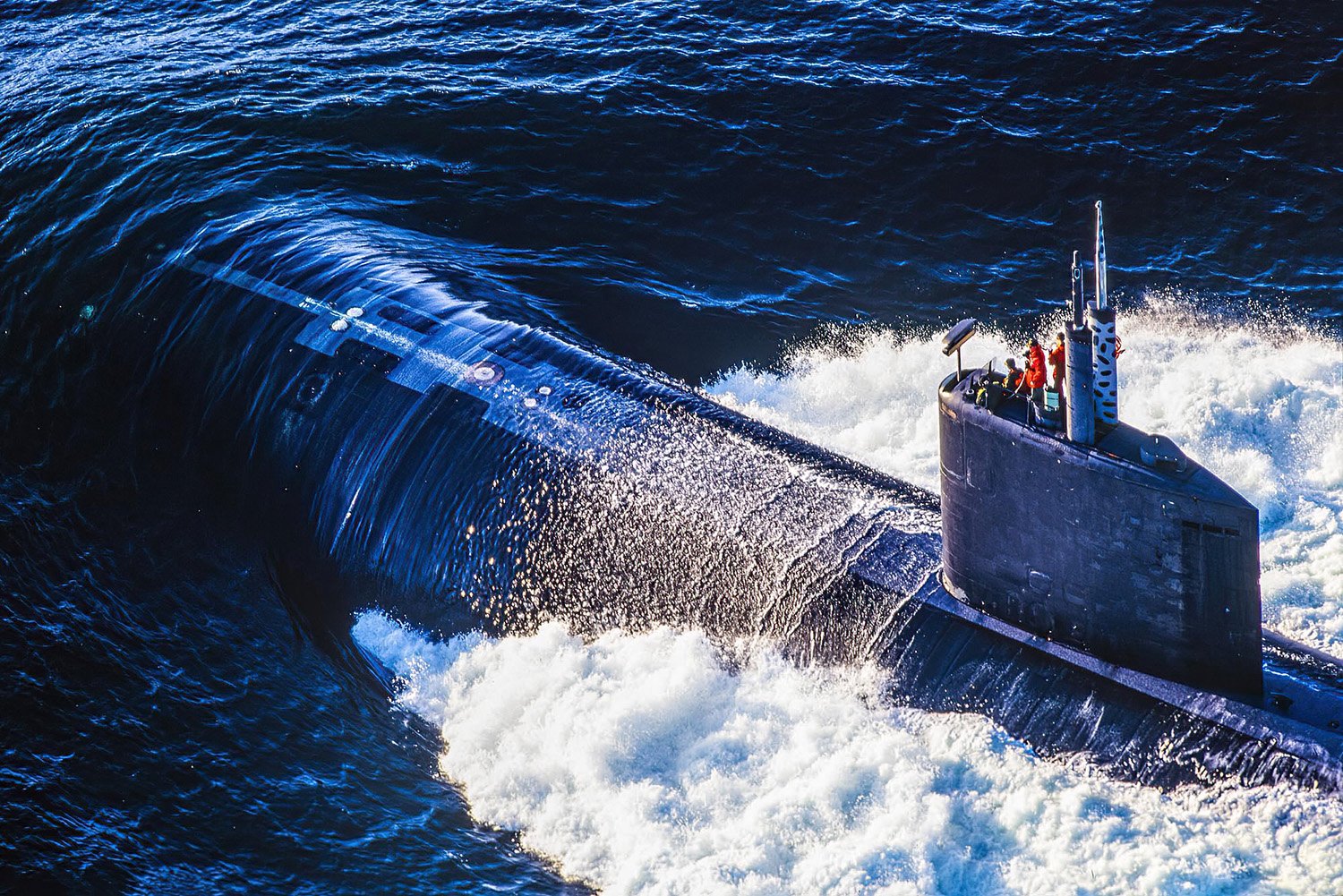 Aerial photo of a US submarine near Nanoose Bay, BC, Canada. The area hosts a Canadian Navy training facility with deep, sheltered waters ideal for practicing submarine operations and sonar exercises.