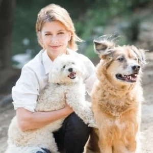 Dr. Whitlock with her dogs Sam & Scout