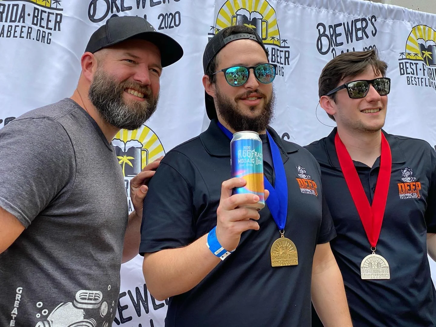 Ryan LaPete, Jon Meyers, and Clayton Henderson with Reefraction Gold Medal Winning Beer at Best Florida Beer Awards.