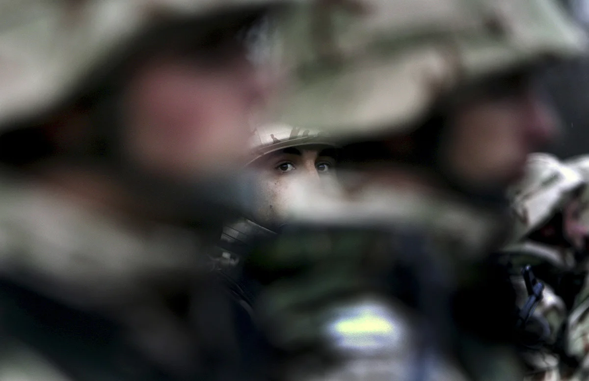 Bulgarian soldiers from the second Bulgarian mechanize military company is seen during an official dispatching ceremony in the town of Karlovo some 145km east from the Bulgarian capital - Sofia, 12 November 2007. Bulgaria is sending off 120 staff soldiers in the second Bulgarian mechanize military company to Kabul, Afghanistan.