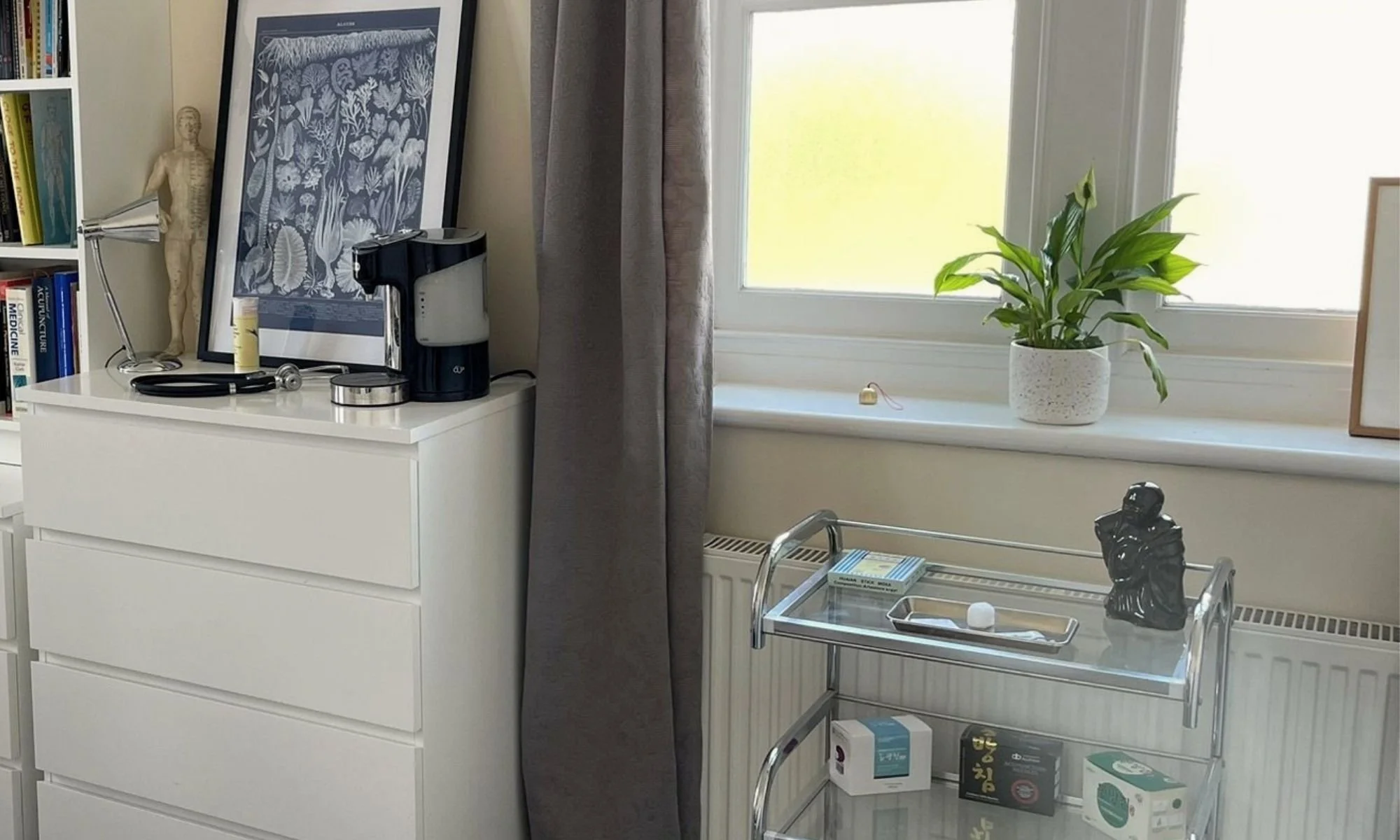 Calm acupuncture treatment room in Lewes with natural light and professional clinical setup
