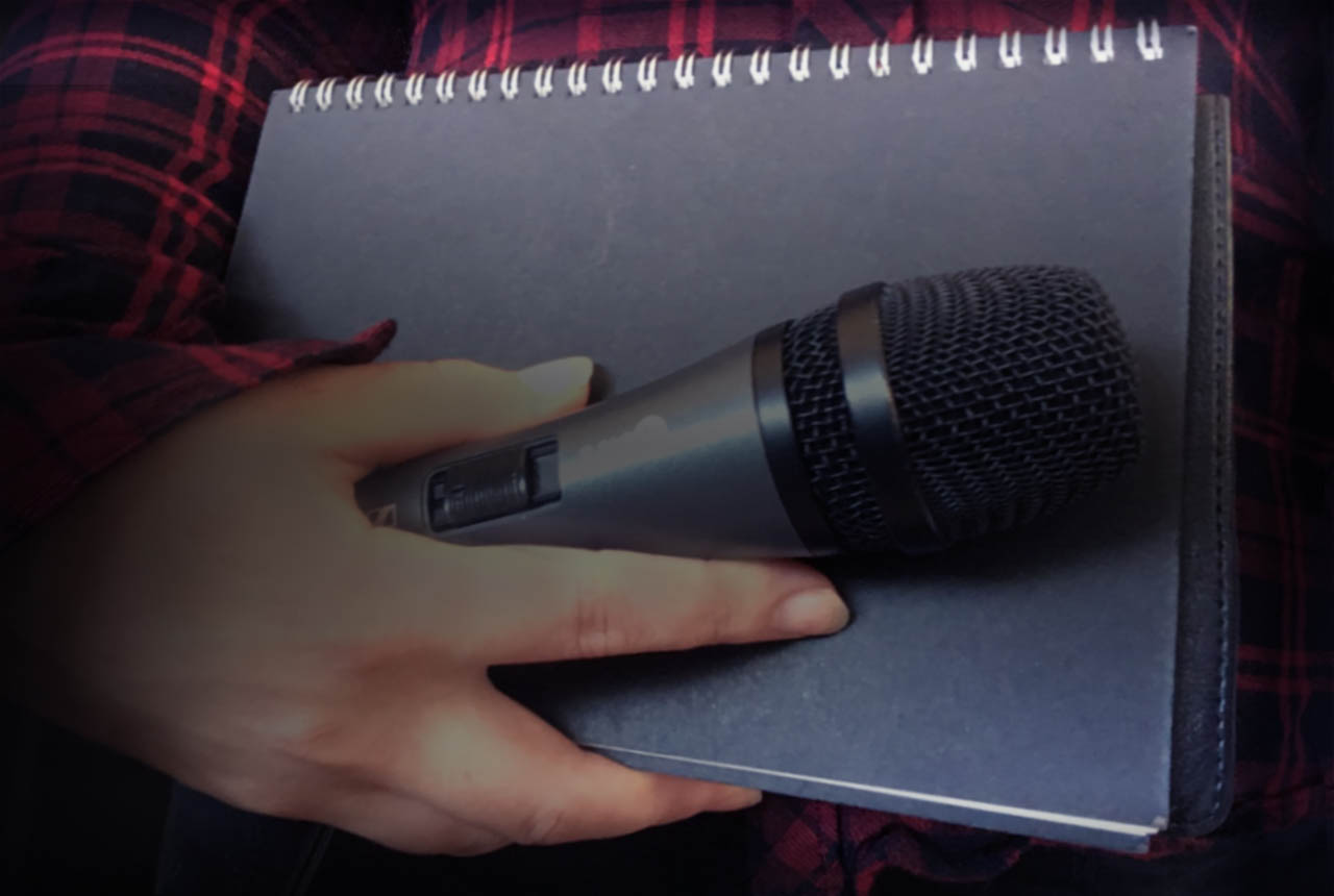 Hand with mic banner.jpg