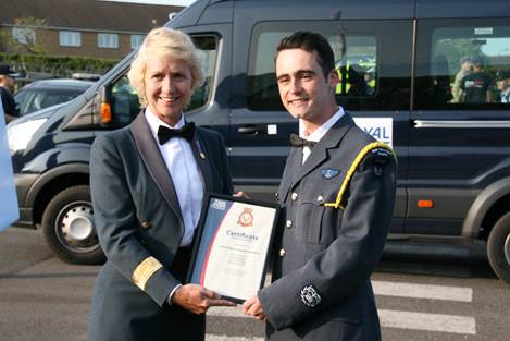 CWO Rafferty receiving his certificate
