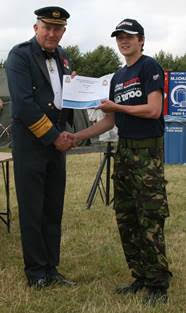 Cpl McClune receiving his award