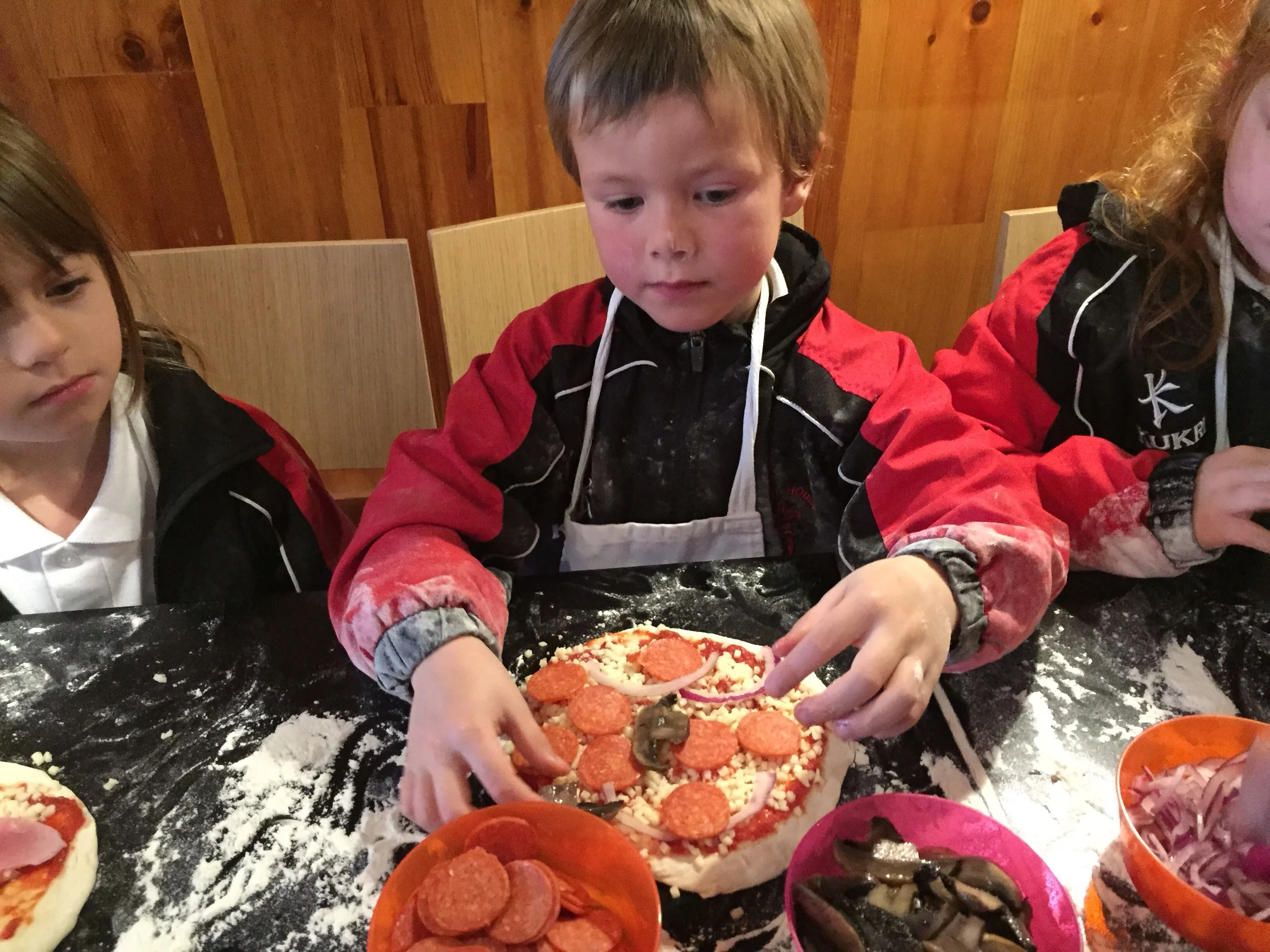 Adding the delicious toppings