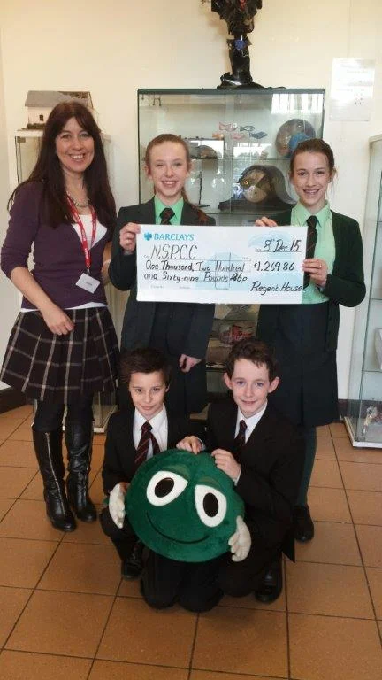 Lisa Rodgers from the NSPCC with Rachel Conkey, Chloe Nesbitt, Andrew Brown and David Anderson from 8A