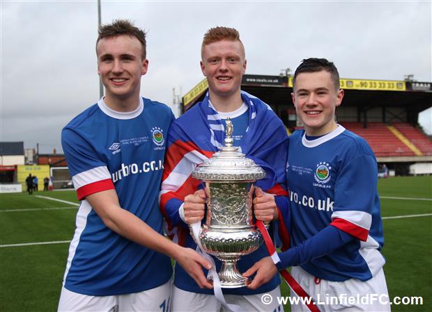 Here are the three boys holding their well-deserved Trophy