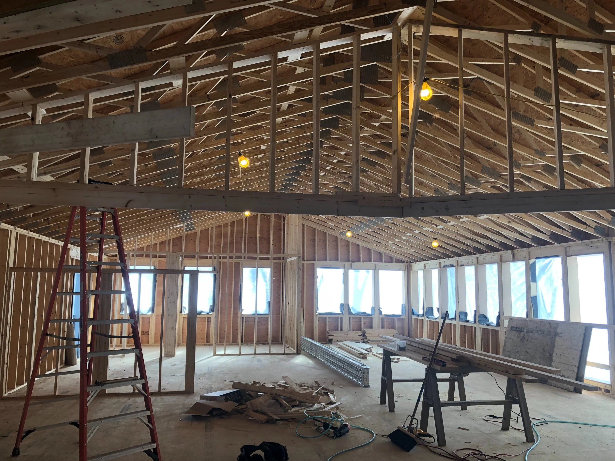 VIEW FROM THE FOYER INTO THE MAIN LIBRARY AREA. CIRCULATION DESK WILL BE ON THE LEFT.