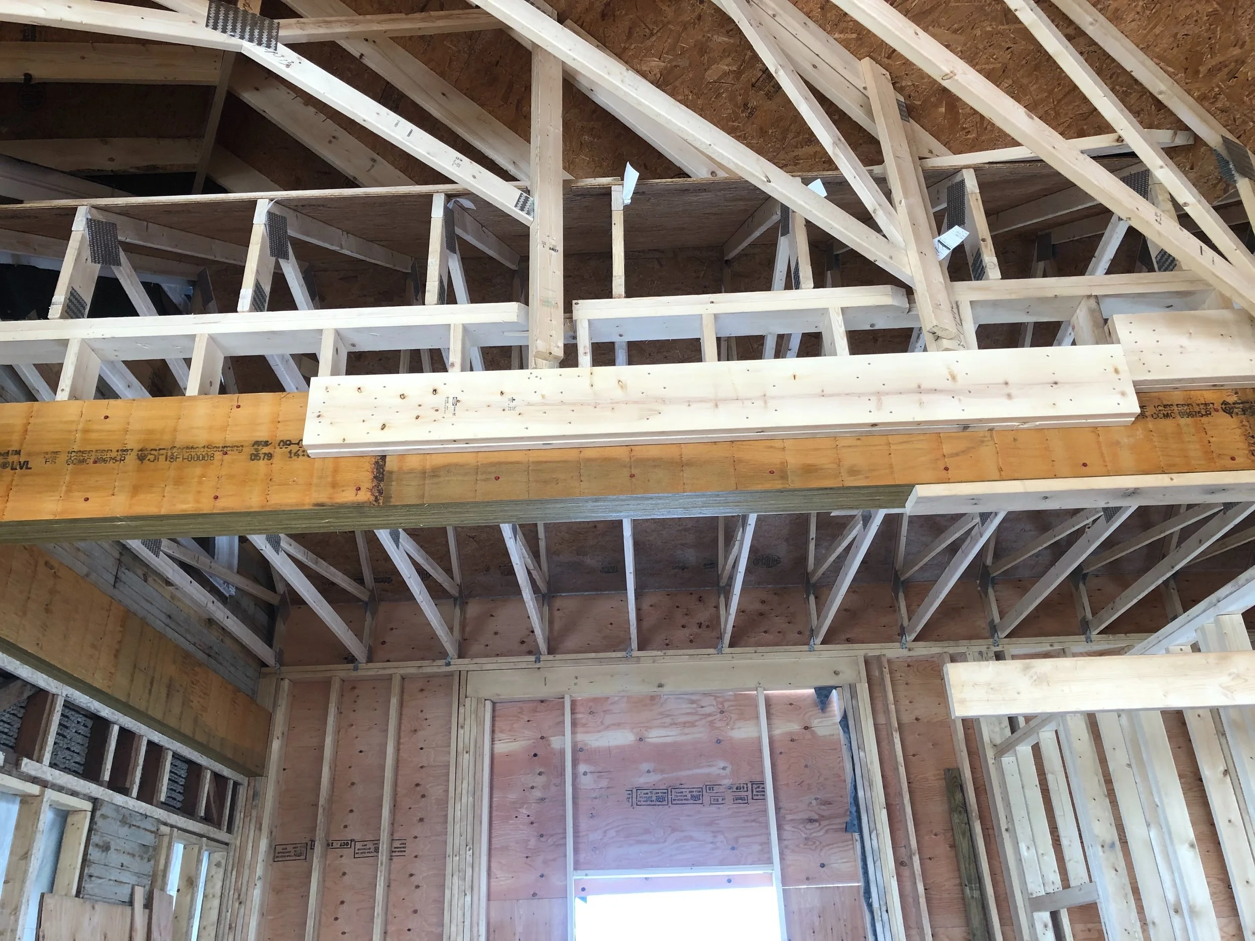 FRAMING DETAIL ABOVE THE ENTRANCE INTO THE LIBRARY