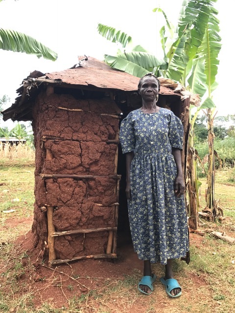 This is Lonika's outhouse BEFORE, which will be torn down. 