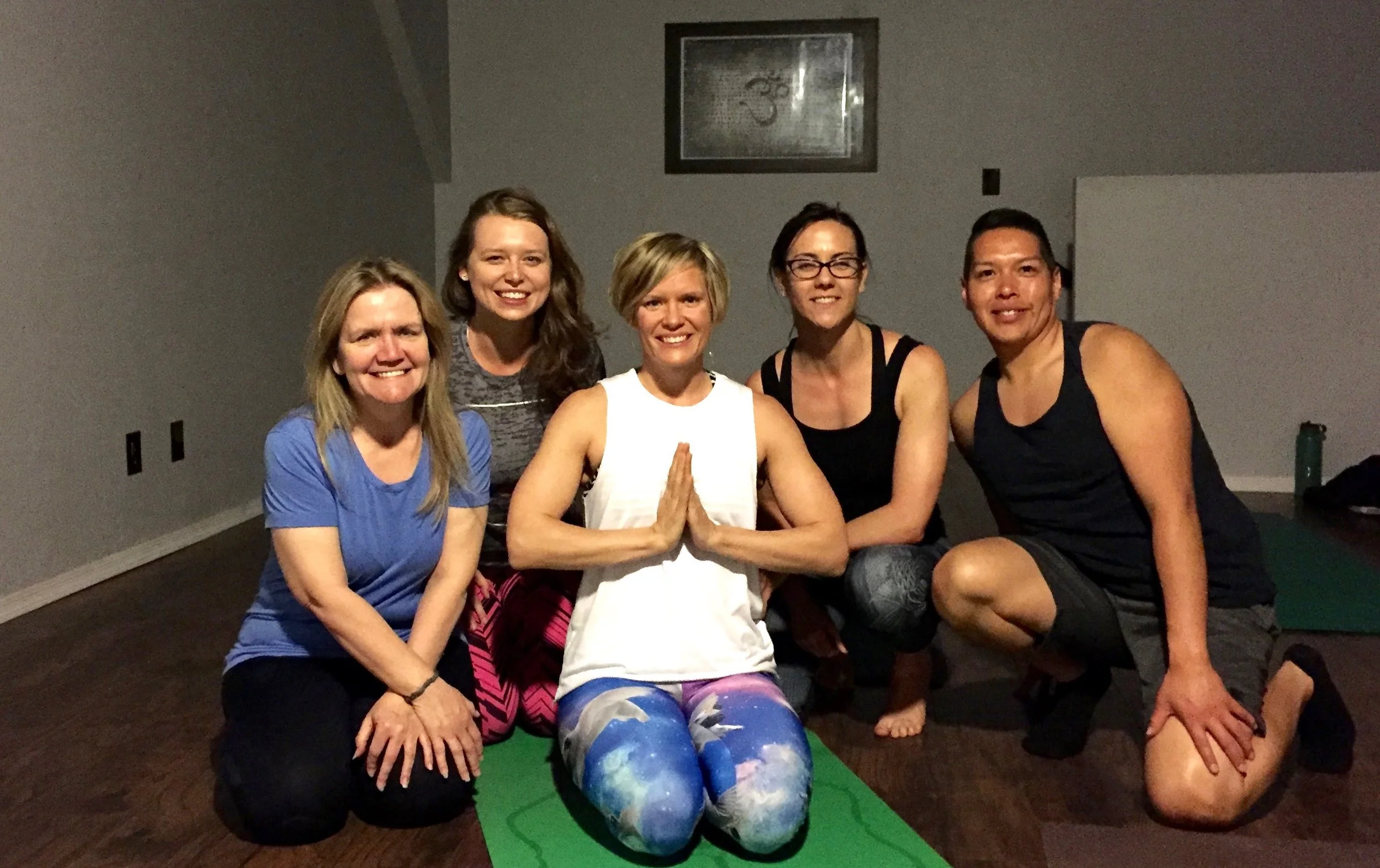 Dawn Baumgartner (center) with Dharma Yoga Students at Crossfit Back on the Bar