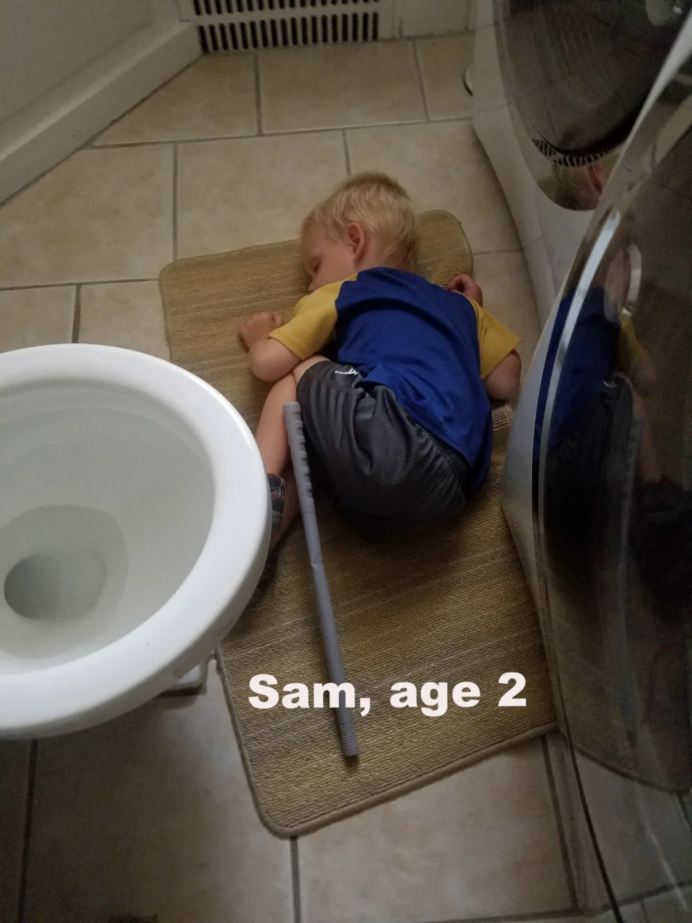 Here lies Sam, worn out after a potty training battle. See? Wouldn't it have been better for the poor little guy if this had been a springier, softer surface instead of this cold, tile floor? YES!