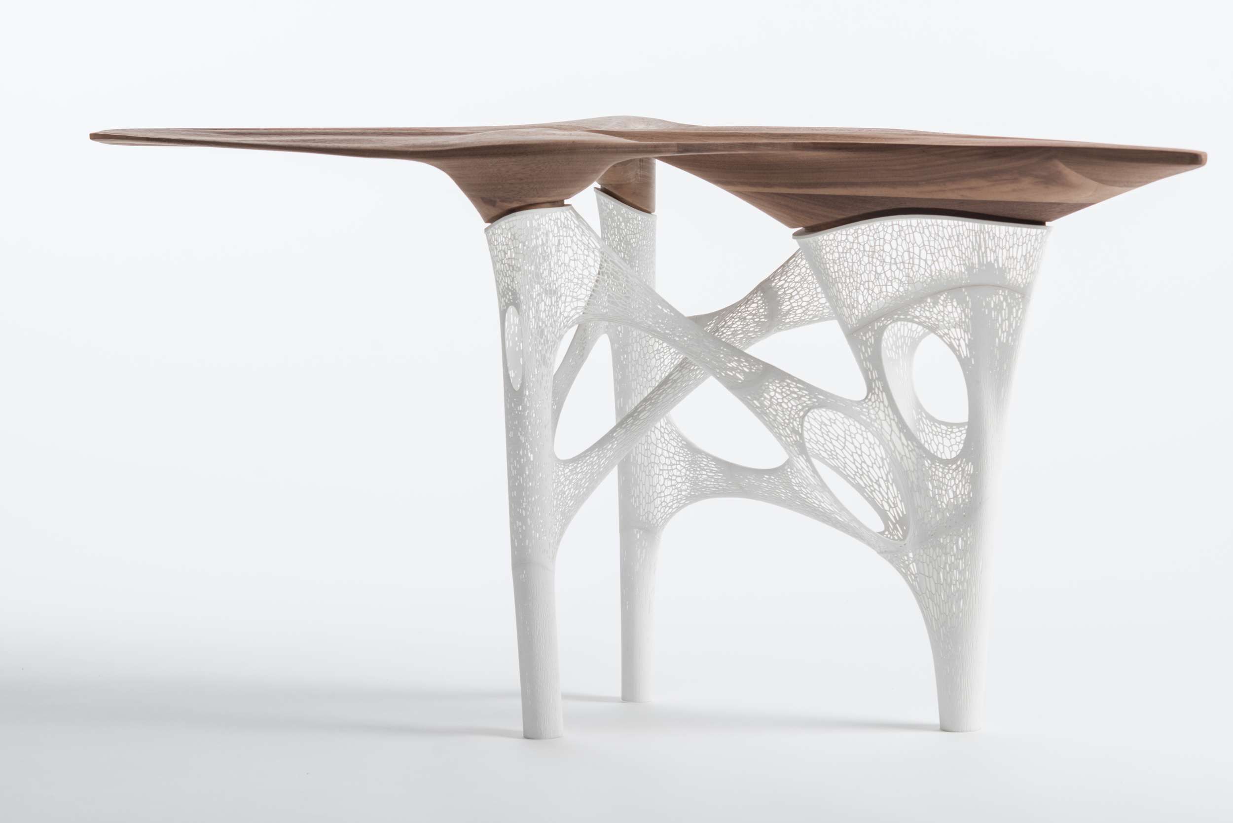 The table prototype belongs to CNAP, Paris and was exhibited at the Centre Pompidou in 2017. Made from CNC-milled walnut top and delicate 3-D prototyped legs, the table is dynamic, structurally challenging, and inspiring. The project is envisaged a