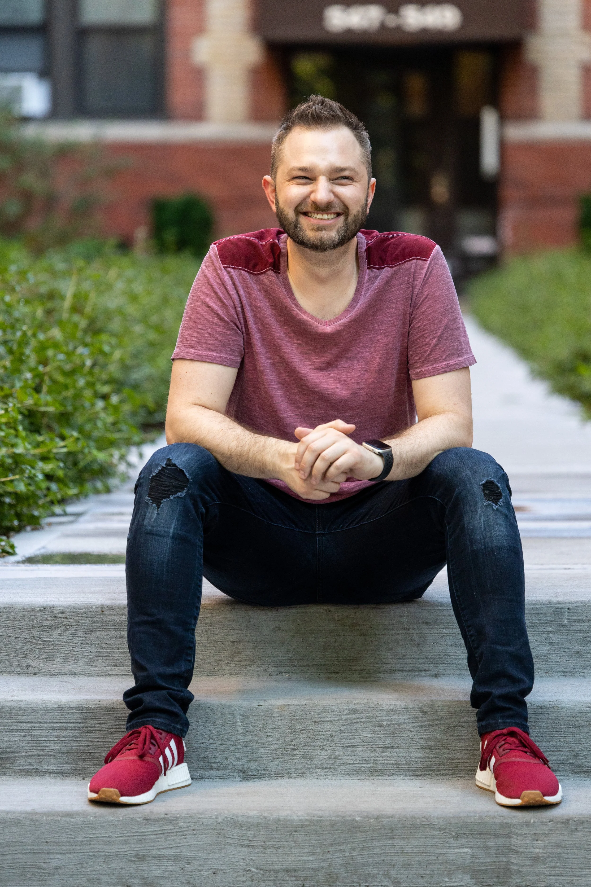 Relaxed Urban Portrait on Apartment Steps