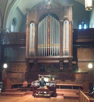 Janet playing organ Sept 27 2015.jpg
