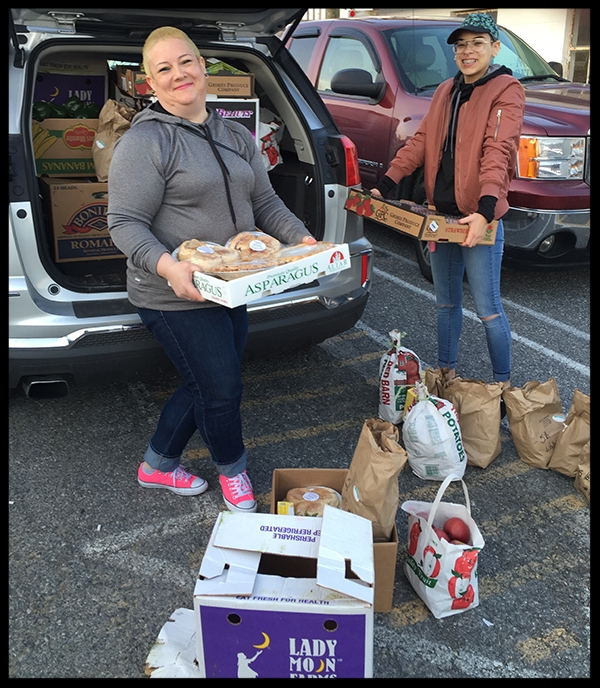 Volunteers helping load up at the Manheim Produce Auction. Over 1,000 pounds bought in one night!
