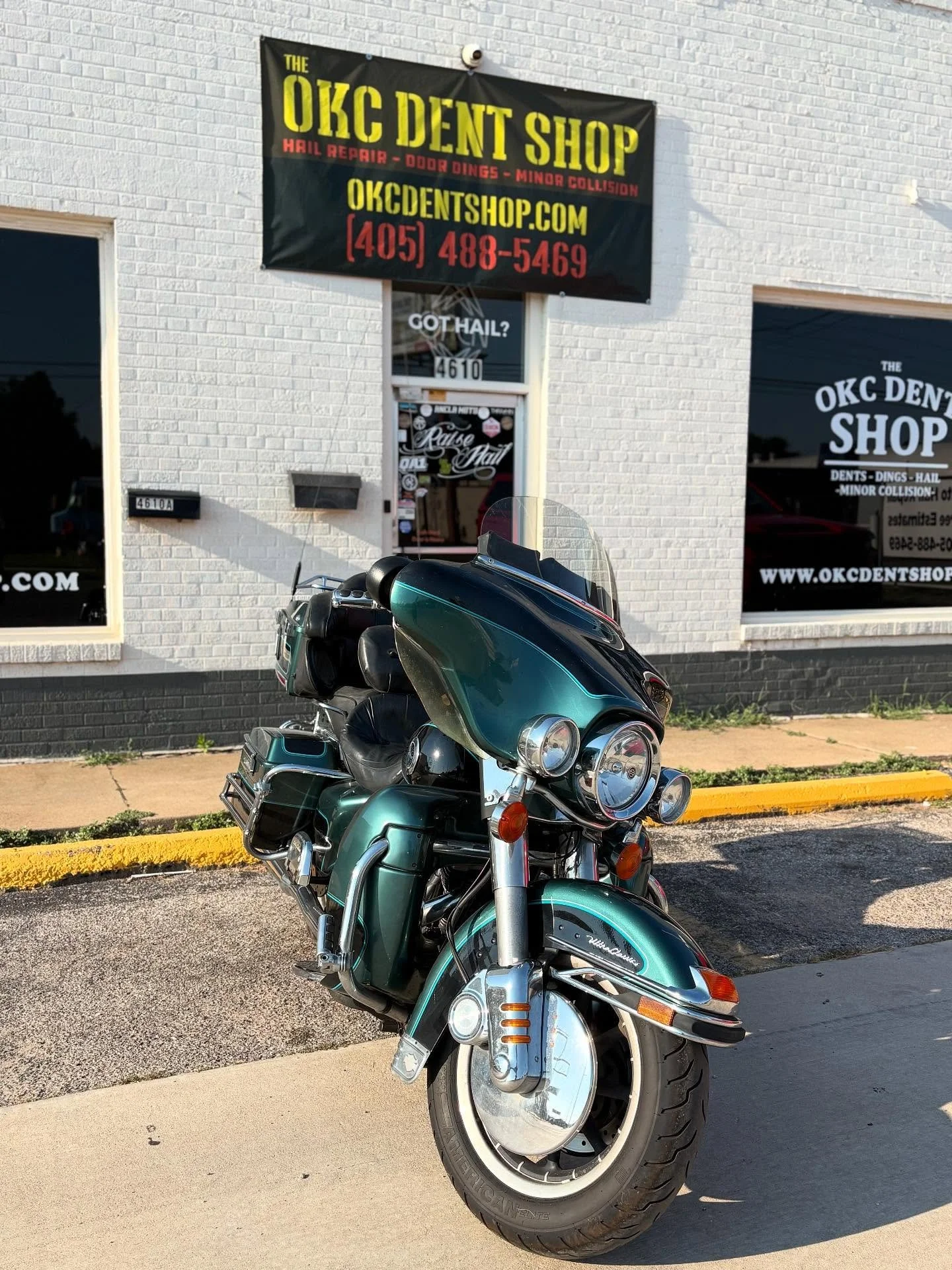 Freshly repaired Harley-Davidson out front of the shop.