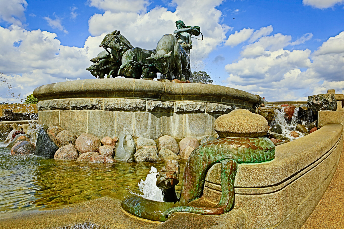 The Gefion Fountain is a large fountain on the harbour front in Copenhagen, Denmark. It features a large-scale group of animal figures being driven by the Norse goddess Gefjon