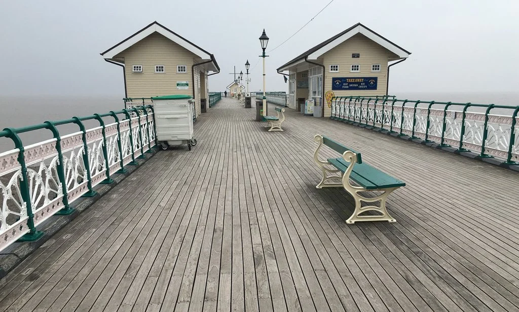 Penarth Pier on an Overcast Day by Kamal Chilaka