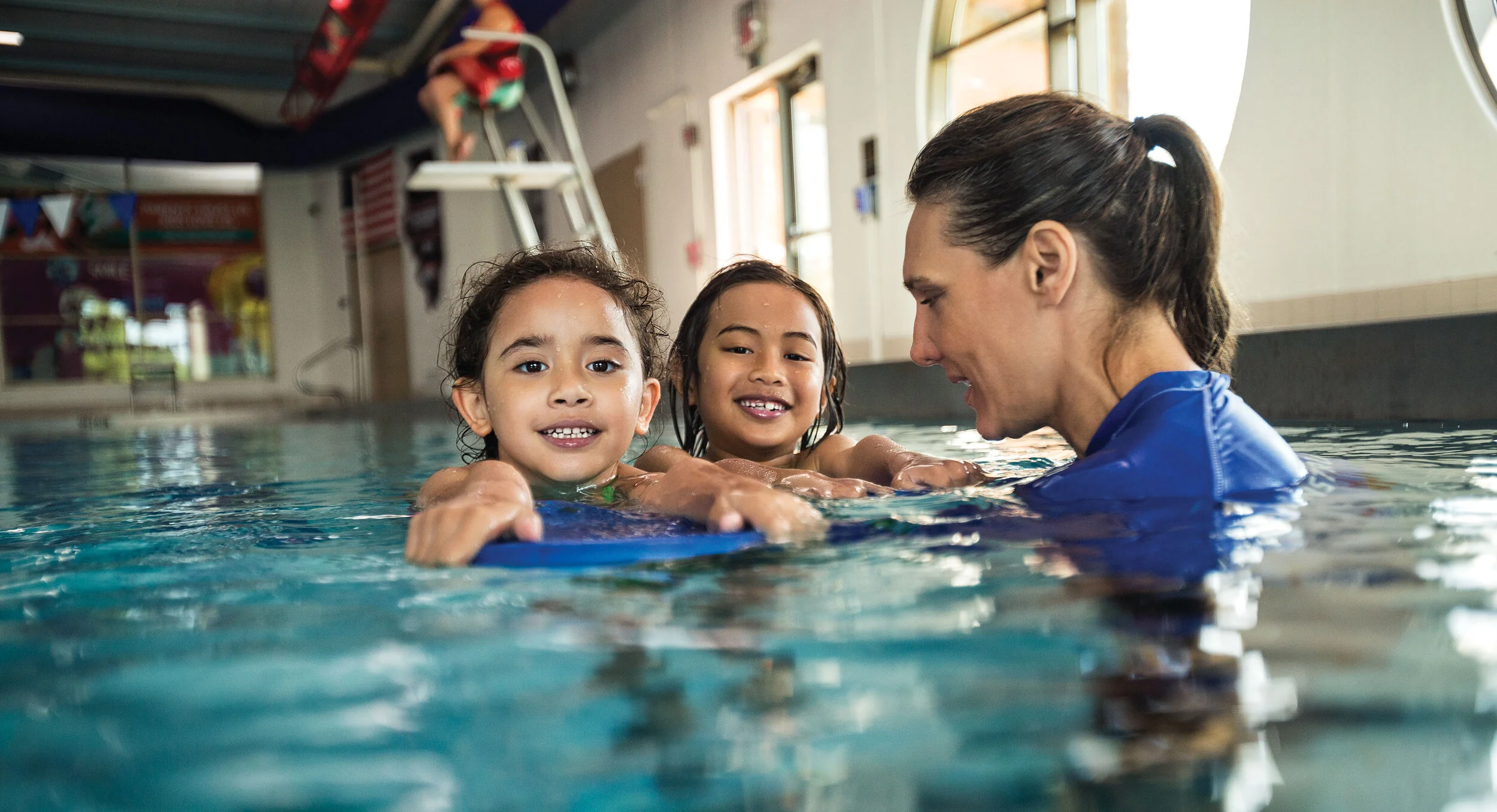 SwimGirlsWithInstructor.jpg