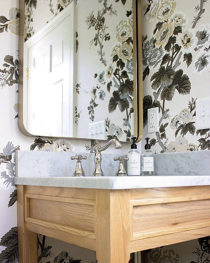 This bathroom from a project a couple of years ago is still one of my all-time favorites. The custom wood vanity and bold pattern elevated the small guest bathroom instantly, turning what could have been a simple space into a real design moment. 

I 