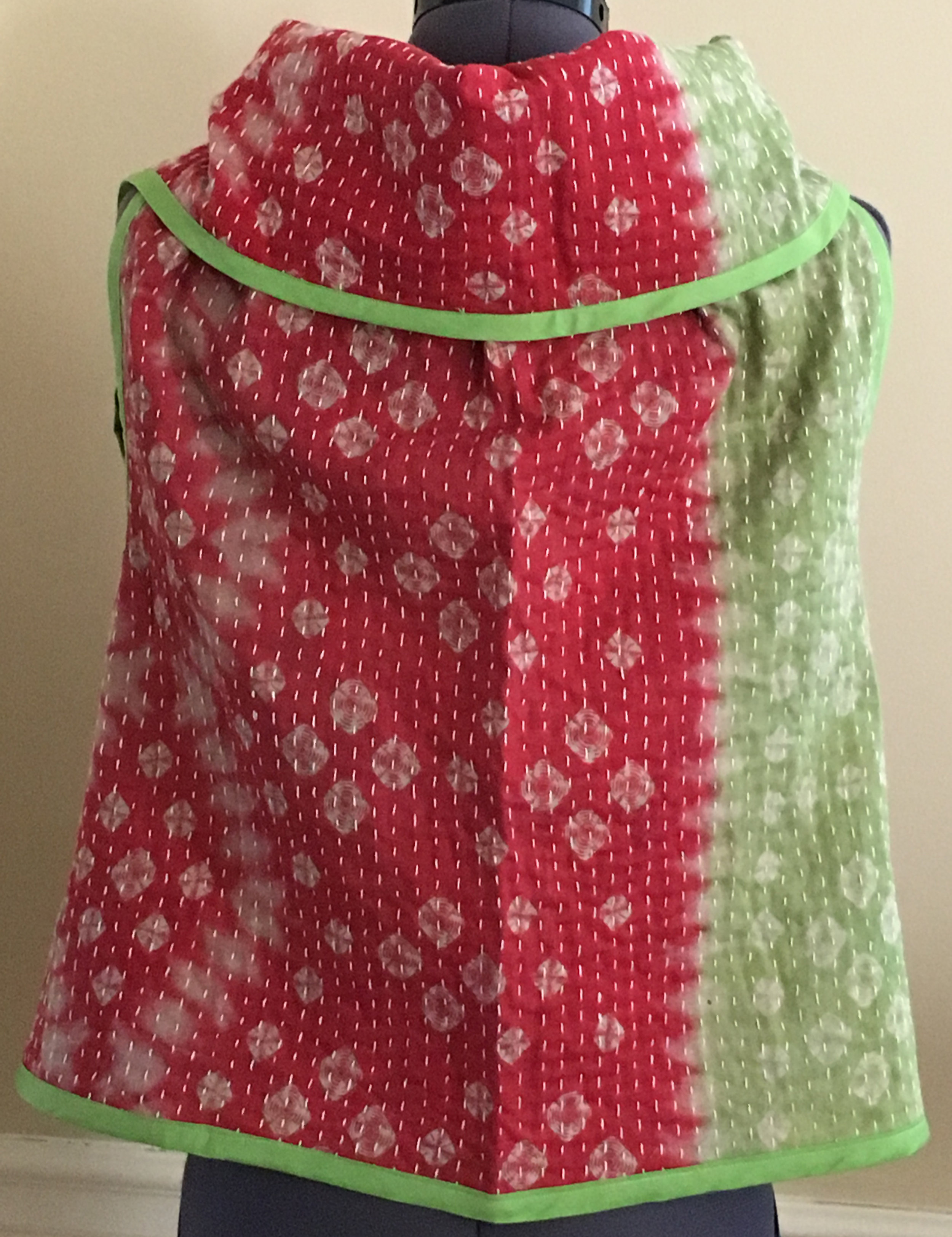 Cherry blossom kantha on model back.jpg