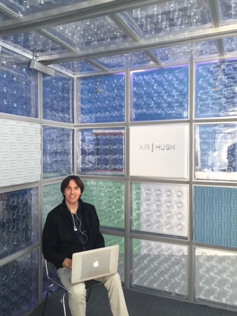 Jim Gray at work in his prototype AirHush office space.