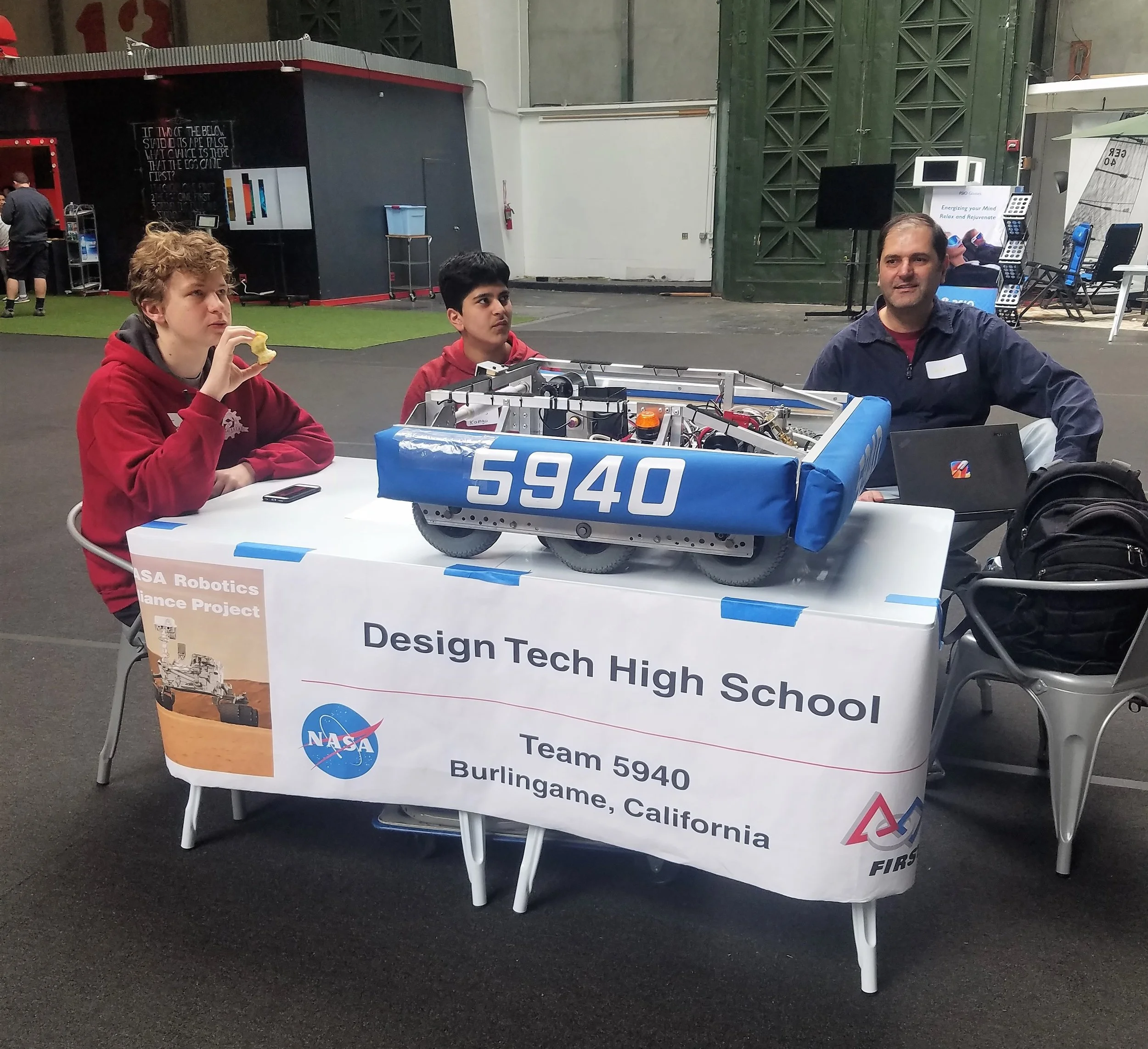 One of the teams sits with its six-wheeled projectile-throwing robotic rover, March 4th, 2017