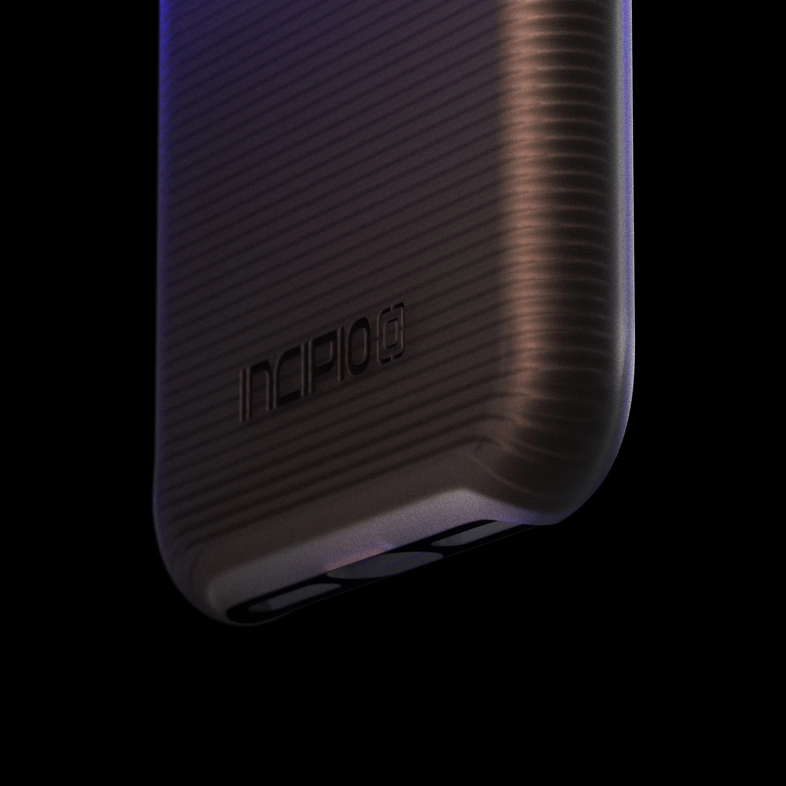 Close-up of a black, textured iPhone case with the brand name 'Incipio' debossed on the back, against a dark background.