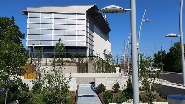 Venice Island Performing Arts Center & Diamond Manufacturing. Numerous sustainable design features, including perforated metal shading.