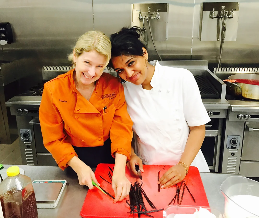 Malika Ameen @byMdesserts and I prepping vanilla for Rhubarb Gazpacho shooters at college kitchens.