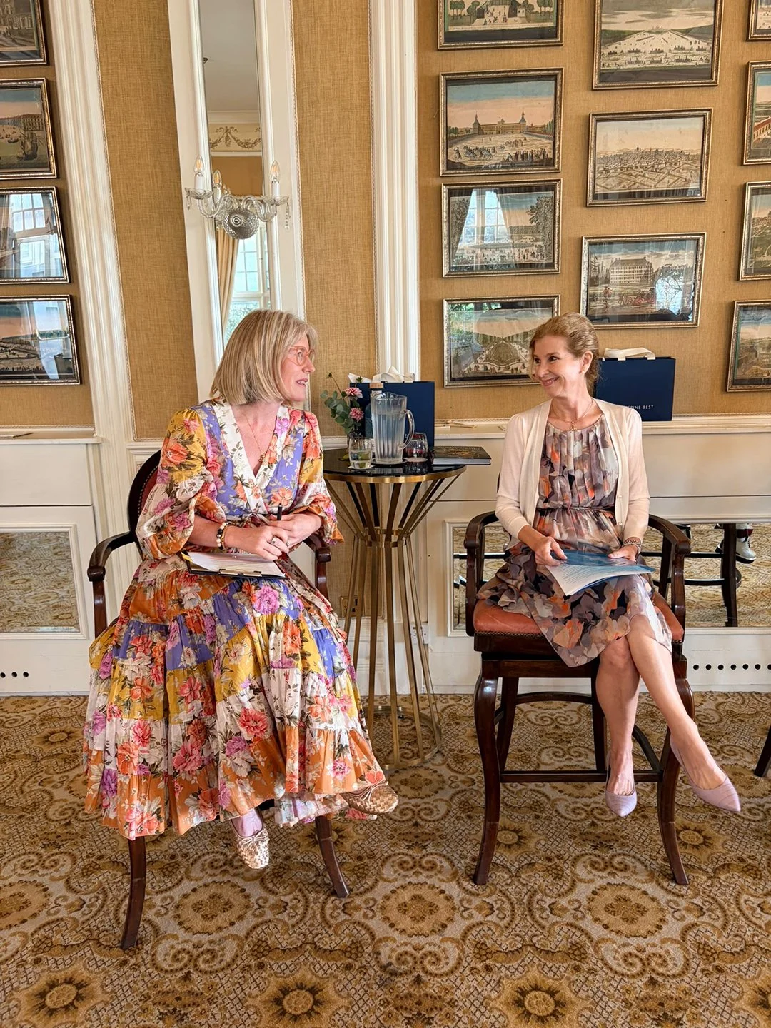 Catherine Moore and Natasha share a moment before the morning’s conversation begins.