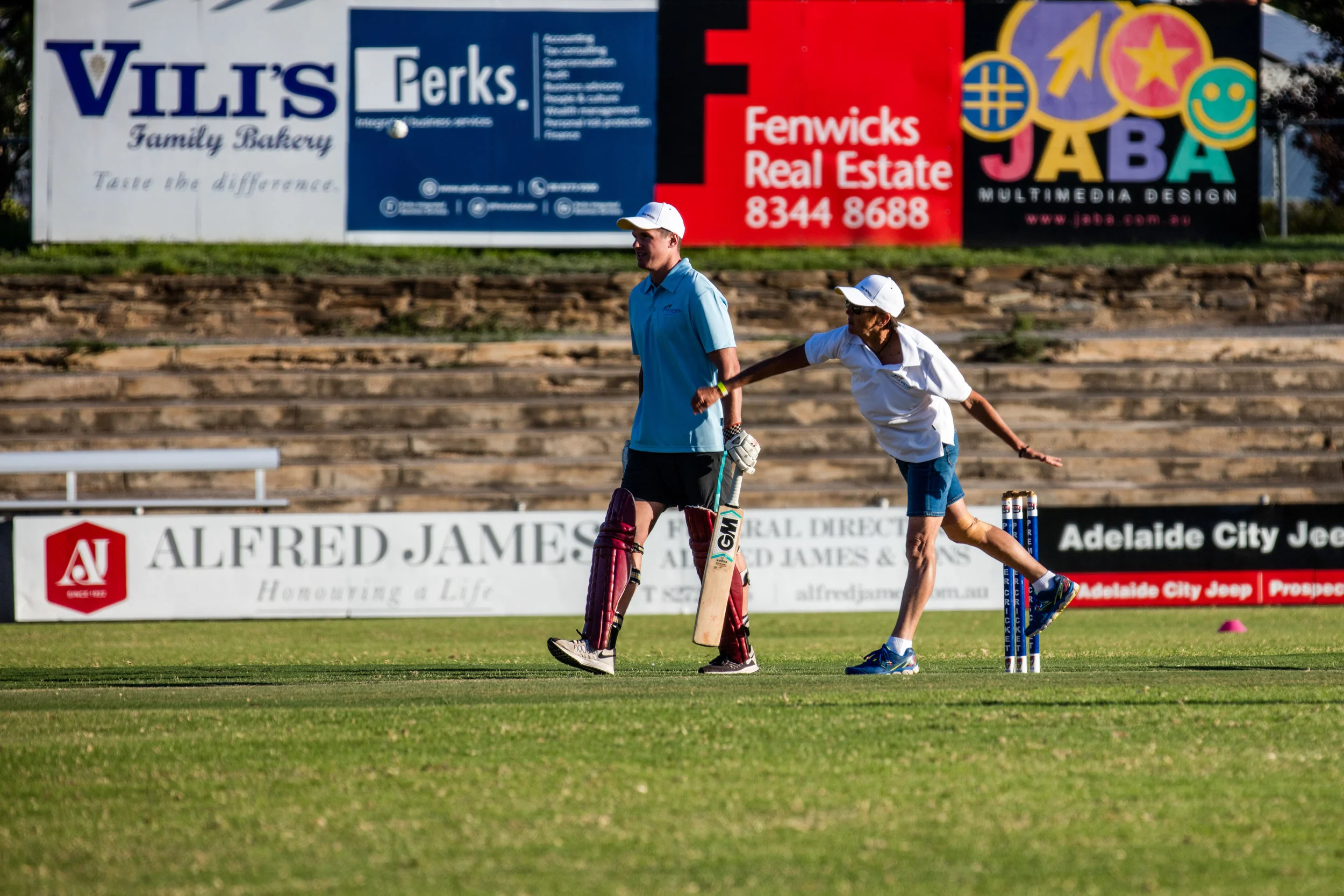 Cheryl from Surf Culture Australia sending a few good balls the Blue teams way. Paul Stewart from Woodville West Torrens FC eager to get to the other end to lay into a couple himself.