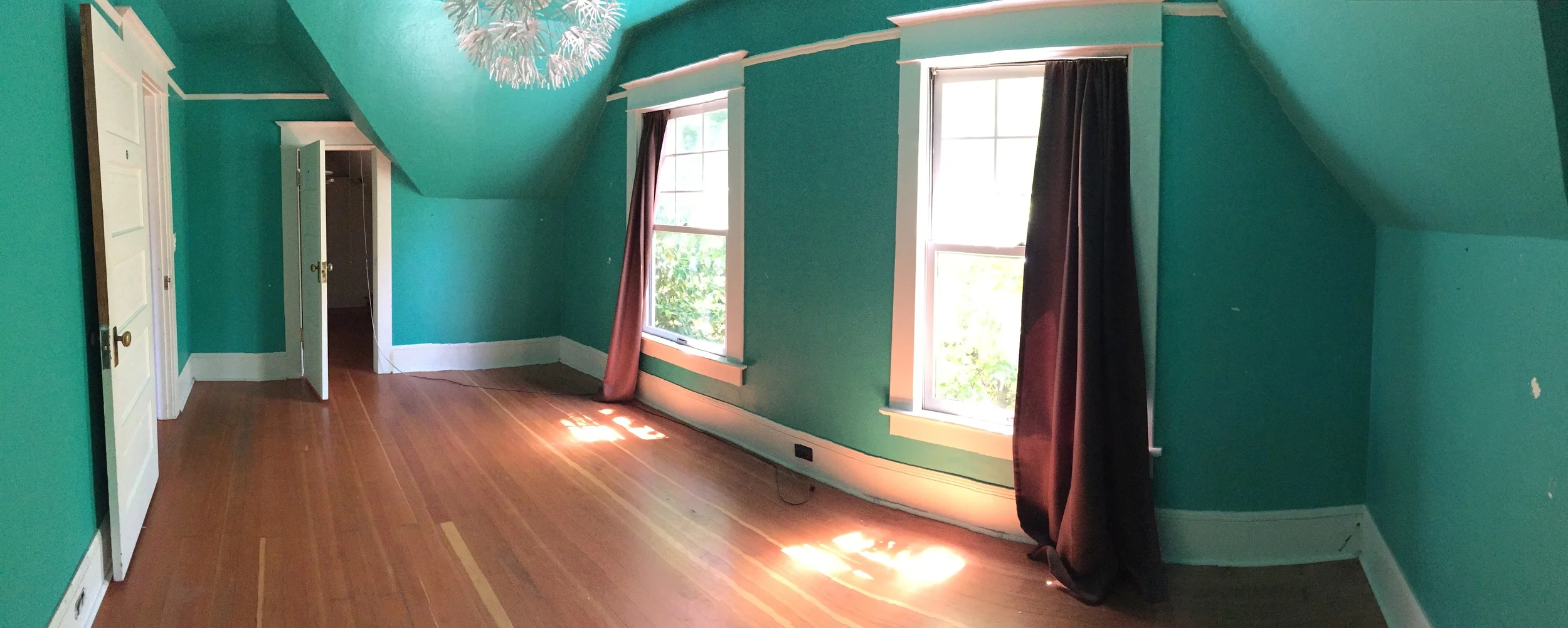 Panorama of south-side bedroom with walk-in closet.