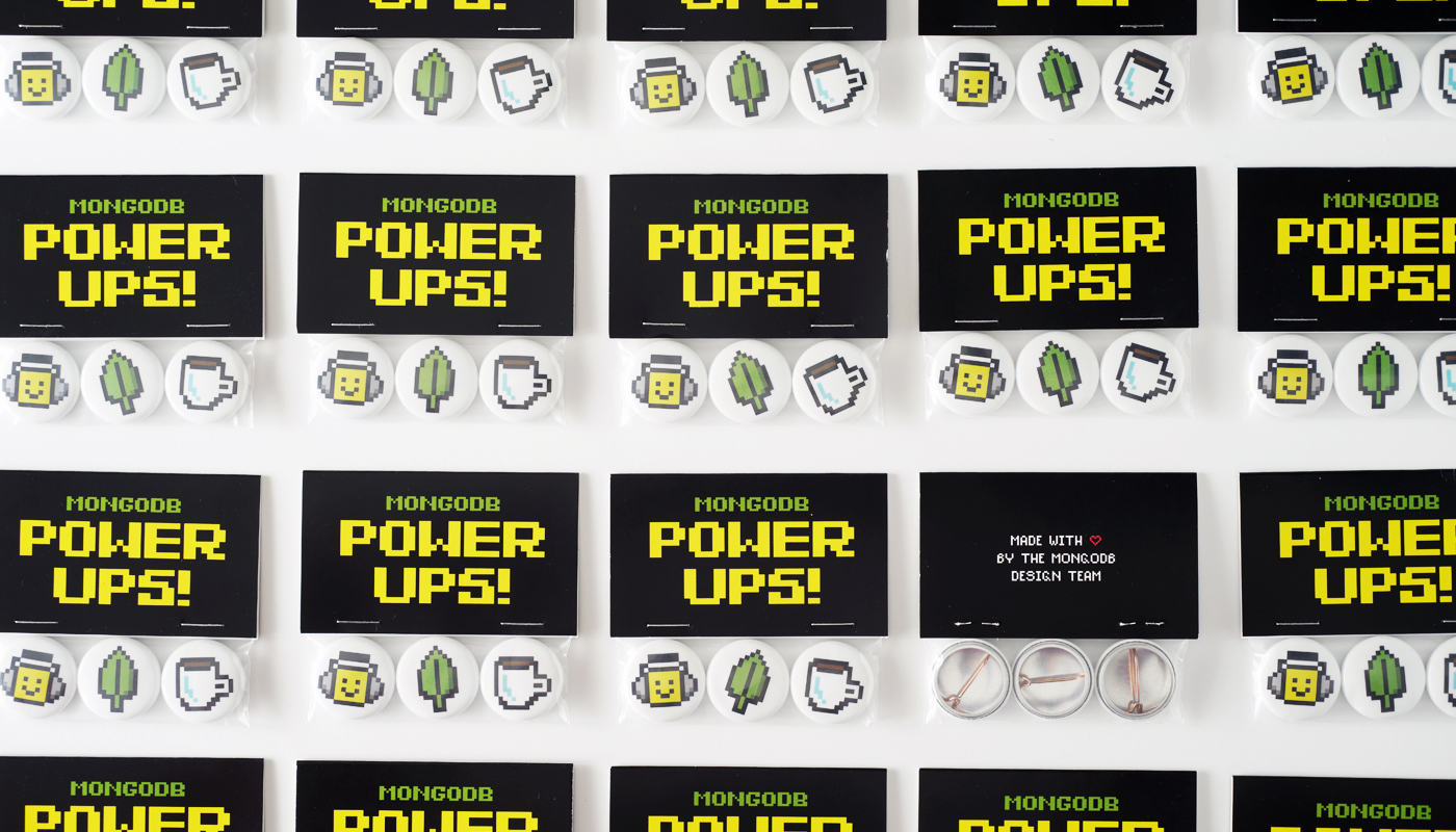 These are buttons with power up items on each. The items are music, the MongoDB leaf, and coffee to fuel up the employees work mode and get their engines going.