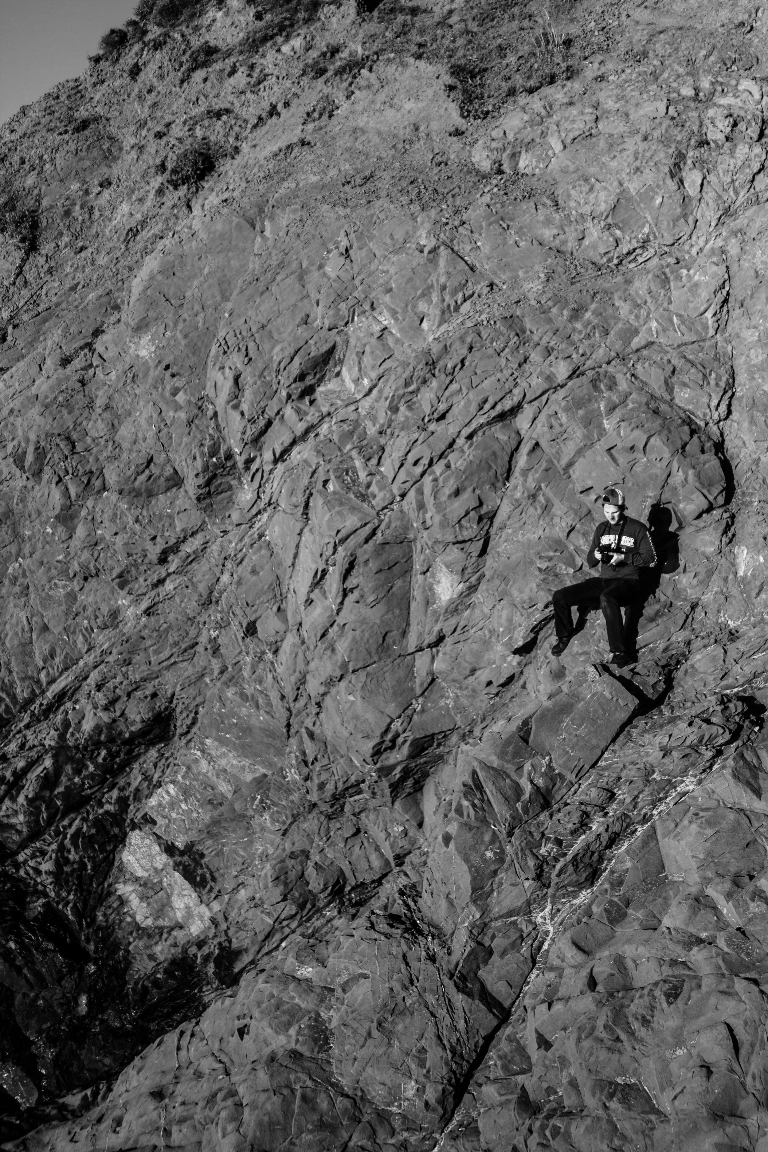 Here's Alex perched on the cliff we climbed down. 