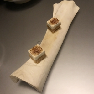 Rendered bone marrow, puffed rice, togarashi, malt vinegar powder, soy powder, tapioca maltodextrin, bone marrow emulsion, nigiri. 