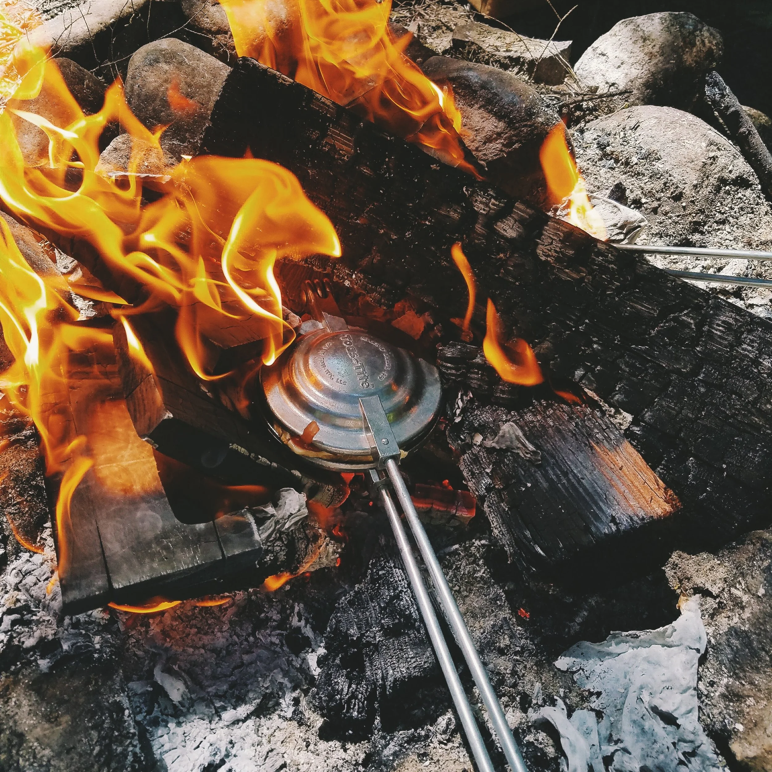 Grilled cheese sandwiches cooked over a campfire were one of my favorite meals all summer