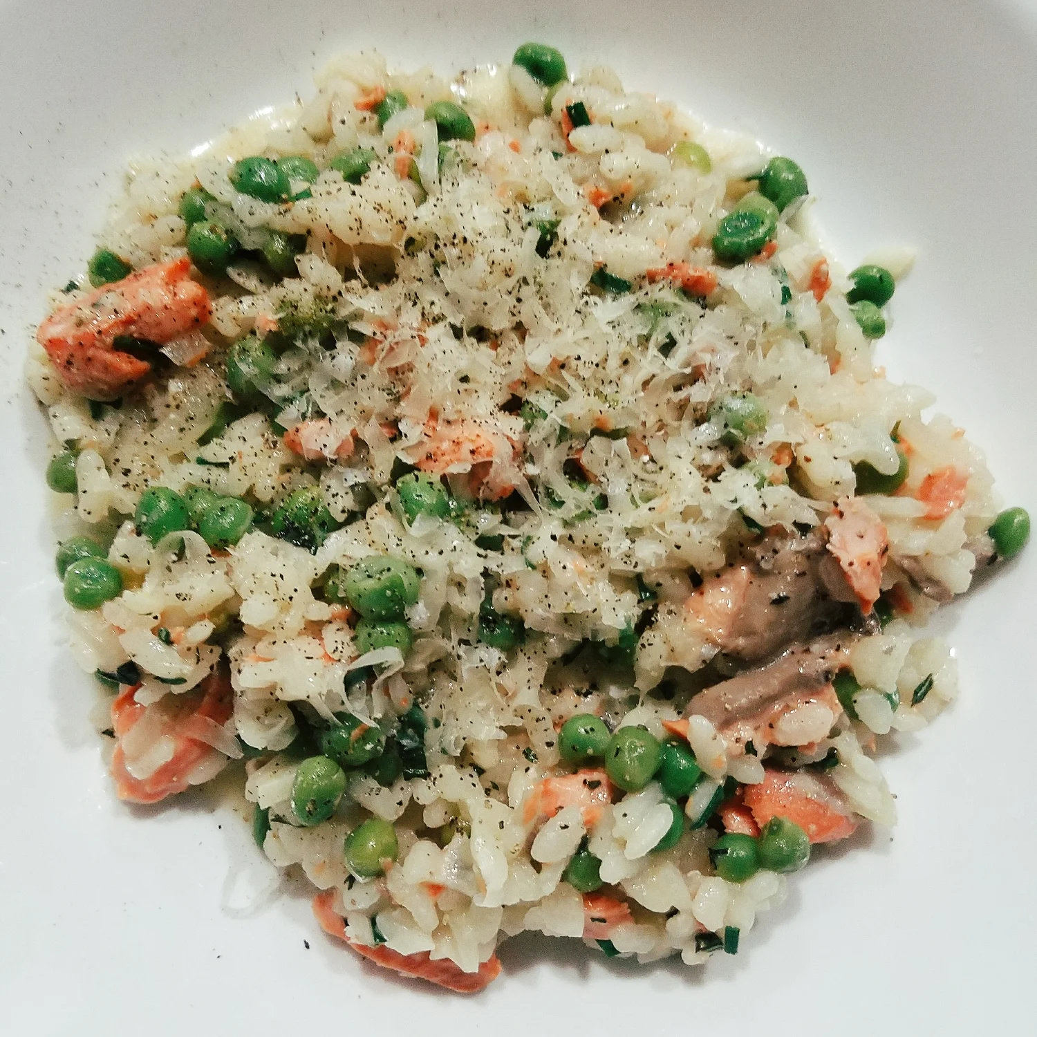 Pea risotto with leftover salmon thrown in turned out to be a new favorite!