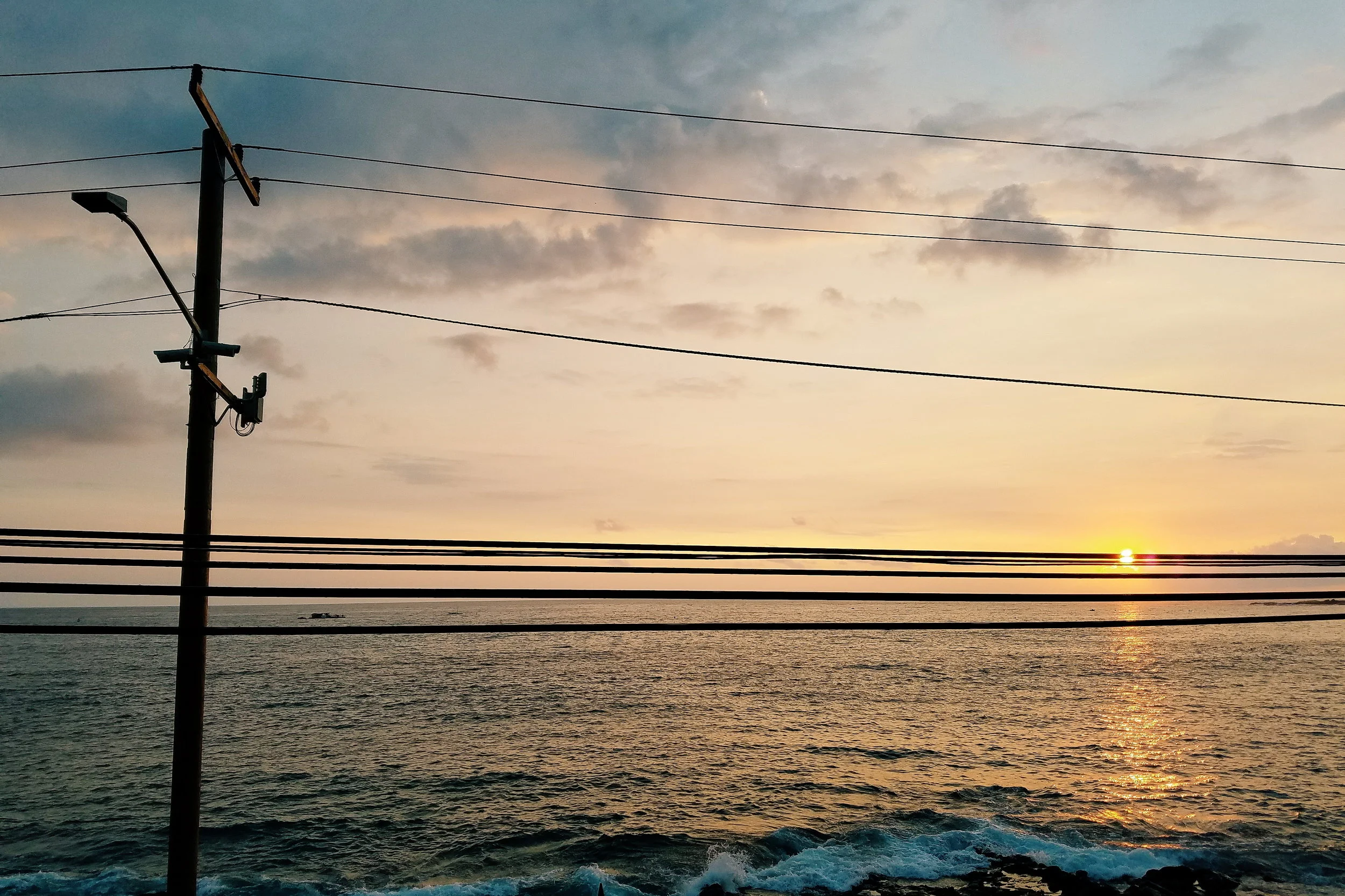 Waterfront sunset dinner with plenty of powerlines!