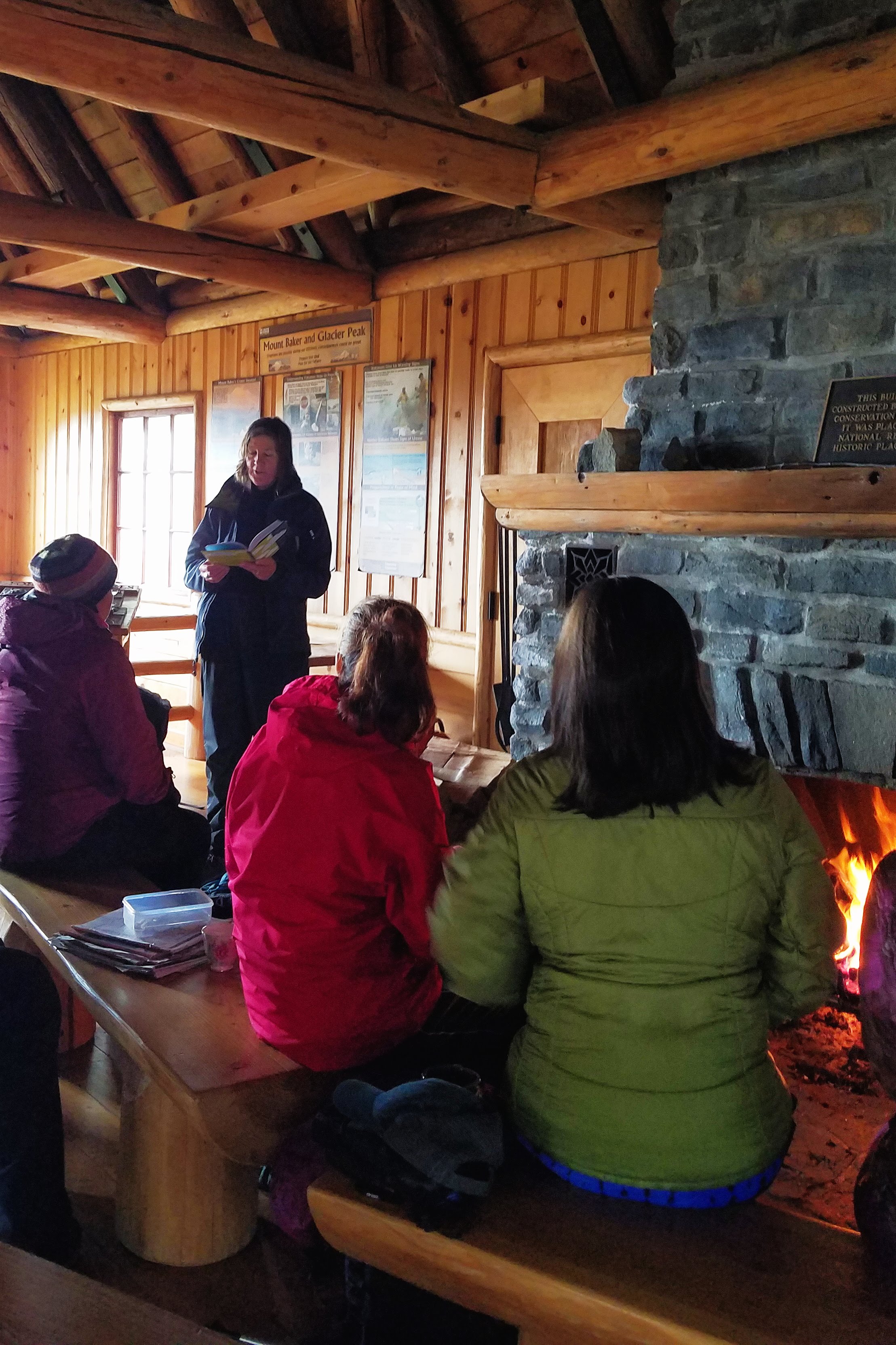 Author Maria Mudd Ruth reading while we warmed ourselves by the fire