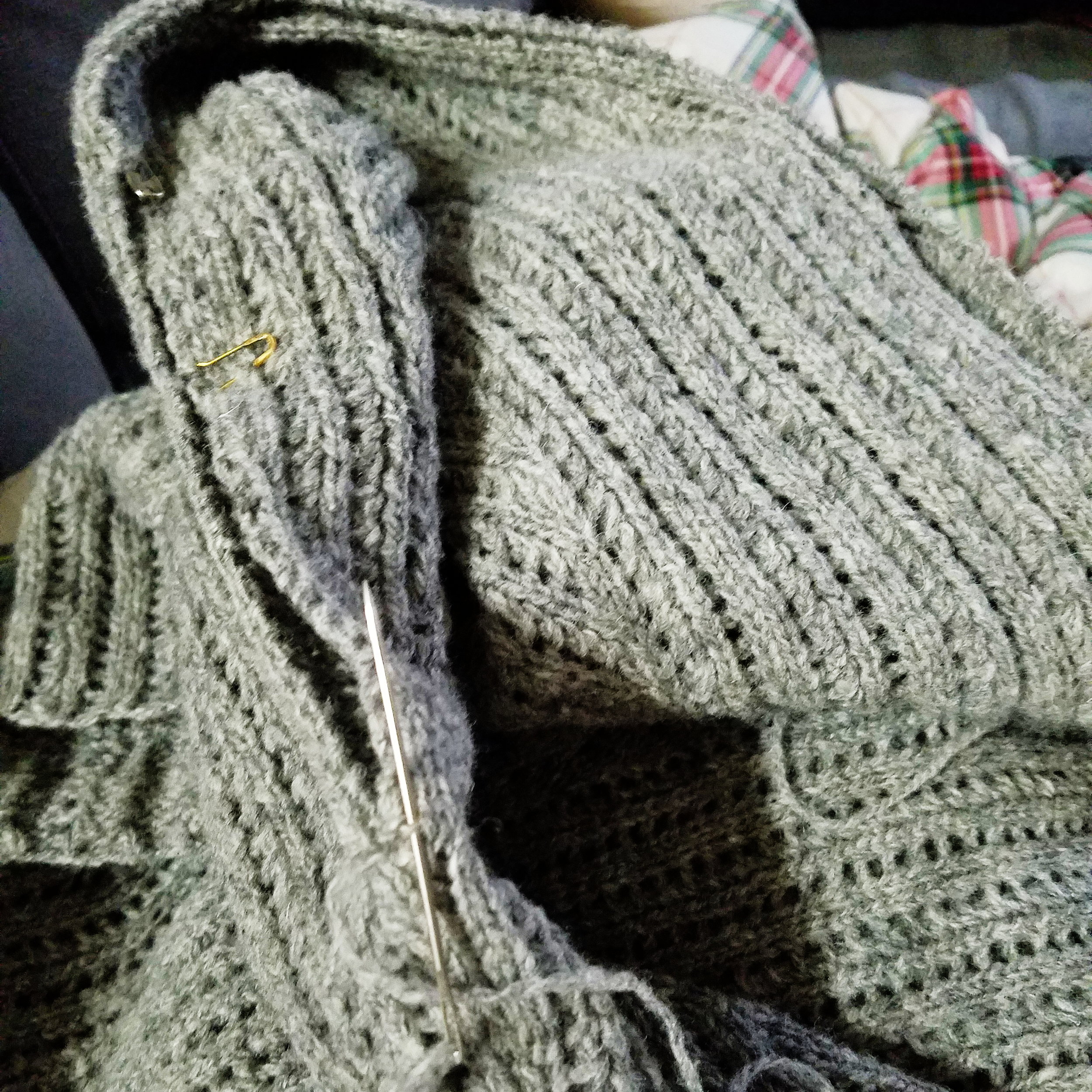 Finished knitting my new sweater, but there’s still plenty of tedious seaming to be done.