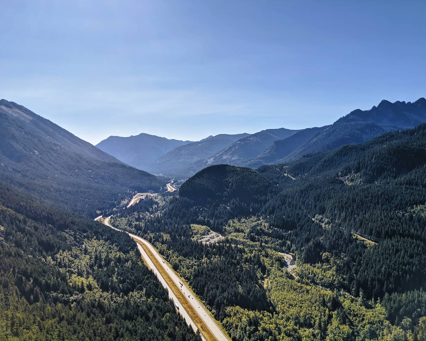 From above, even a major interstate freeway becomes a tiny ribbon threading between evergreen behemoths. Perspective feels especially important these days, and it's felt so good to be reminded of how small we truly are.