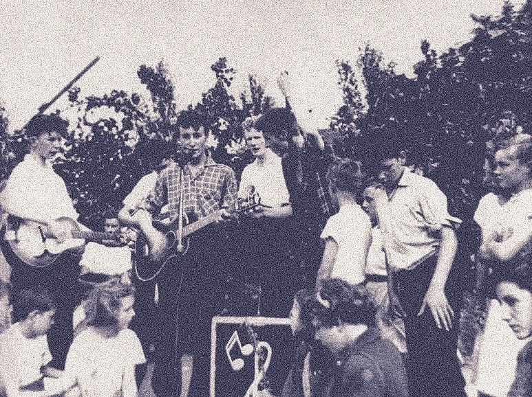 left: John Lennon, at 16 years of age, in 1957, with his Gallotone Champion acoustic guitar. right: The Quarrymen , playing their now famous gig at St Peter’s Church Fête, July 1957.