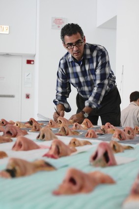 Artist Dennis Kardon prepares his installation of "Jewish noses" which was featured in shows at the Jewish Museum, the Hammer and elsewhere.