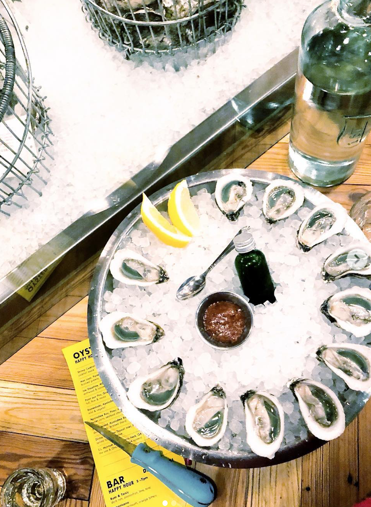 Divine Pine oysters from North Carolina plated at Watchman’s Seafood & Spirits in Atlanta. Photo: jessgraves.com