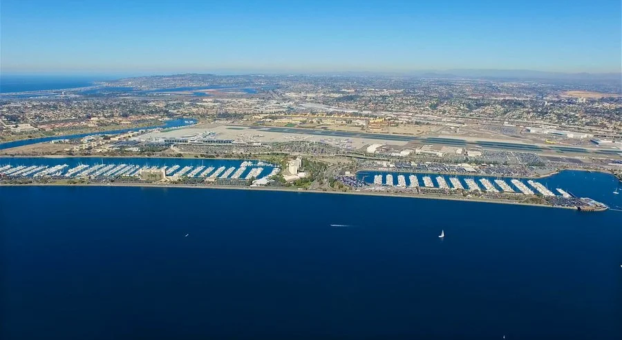  The 57 acres of land and water encompassing part of Harbor Island and the site of the rental car lots along Harbor Drive would be redeveloped under six bids submitted to the port district.&nbsp;San Diego Unified Port District 