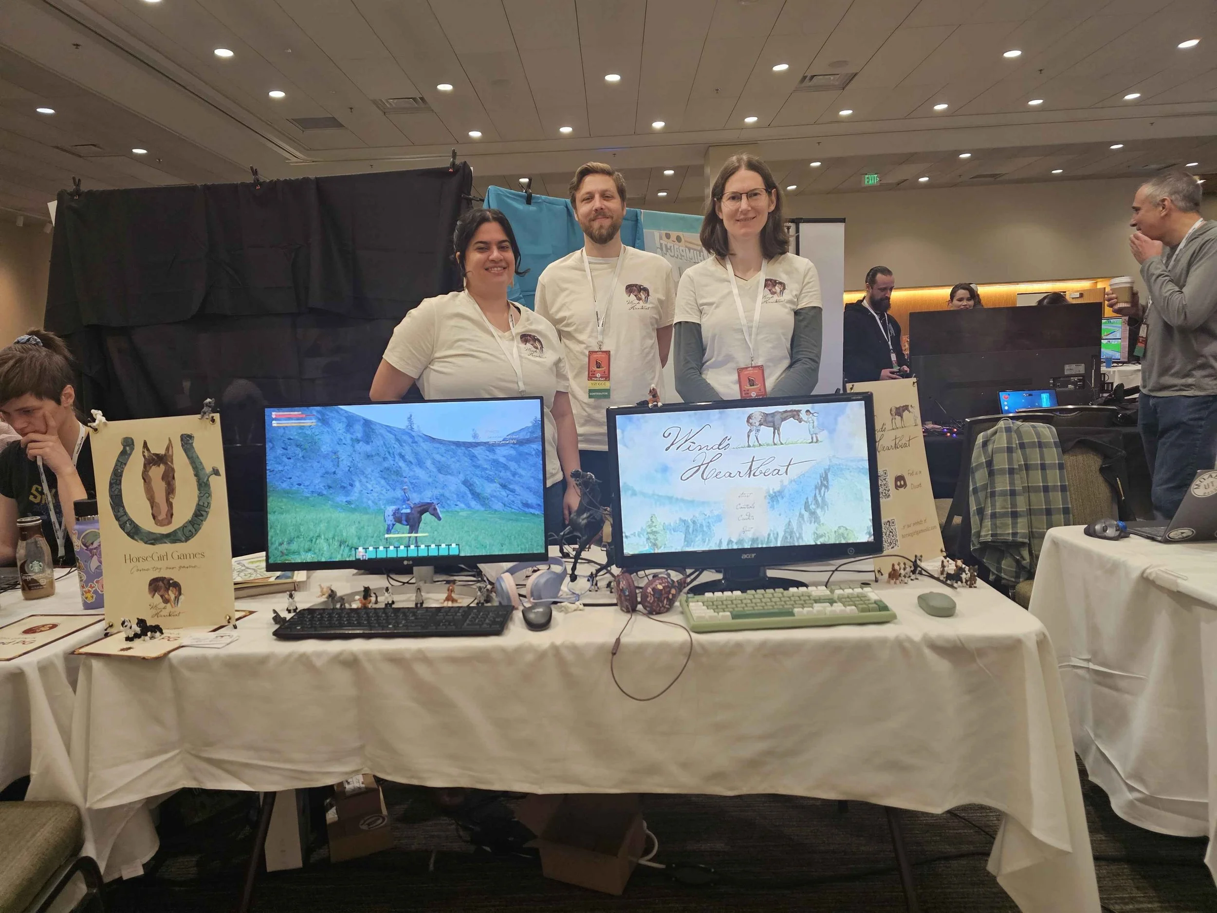 Nayaki and Leslie at GeekGirlCon 2025, with a demo of the game.
